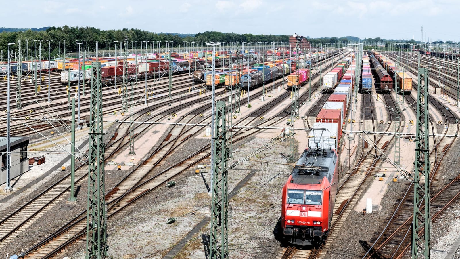 Expansive view of cargo trains at Hamburg's bustling rail terminal.