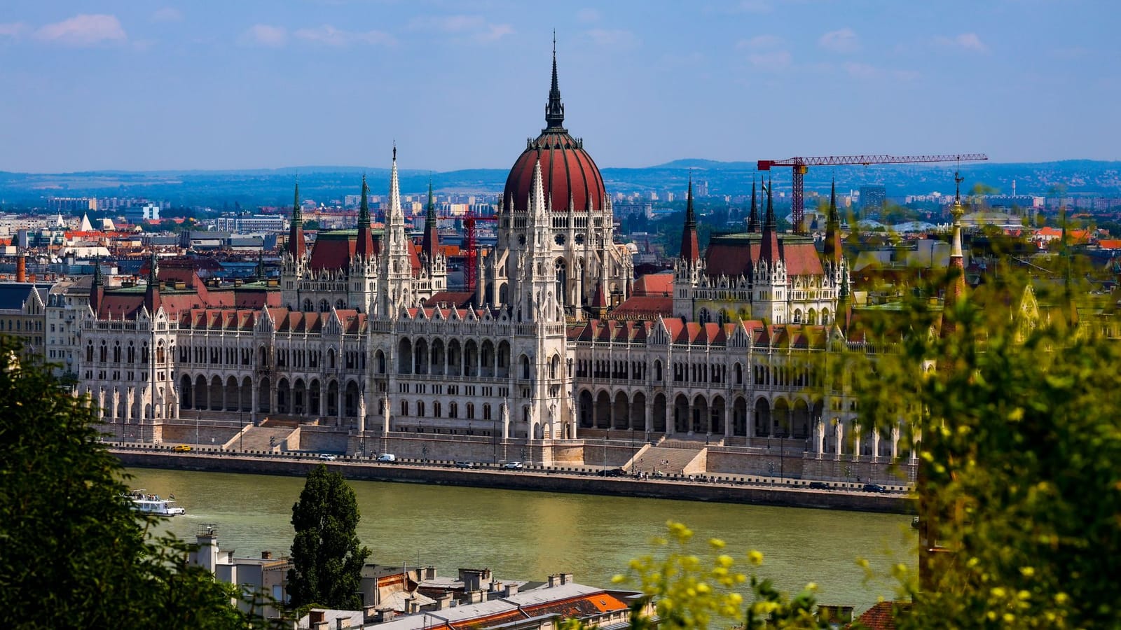 A breathtaking view of the iconic Hungarian Parliament Building on a sunny day in Budapest, Hungary.
