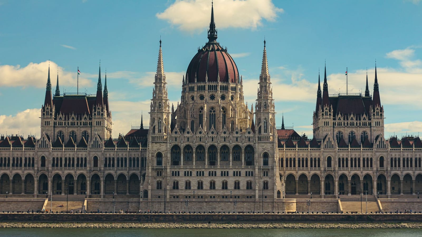 Majestic view of the Hungarian Parliament Building in Budapest along the Danube River.