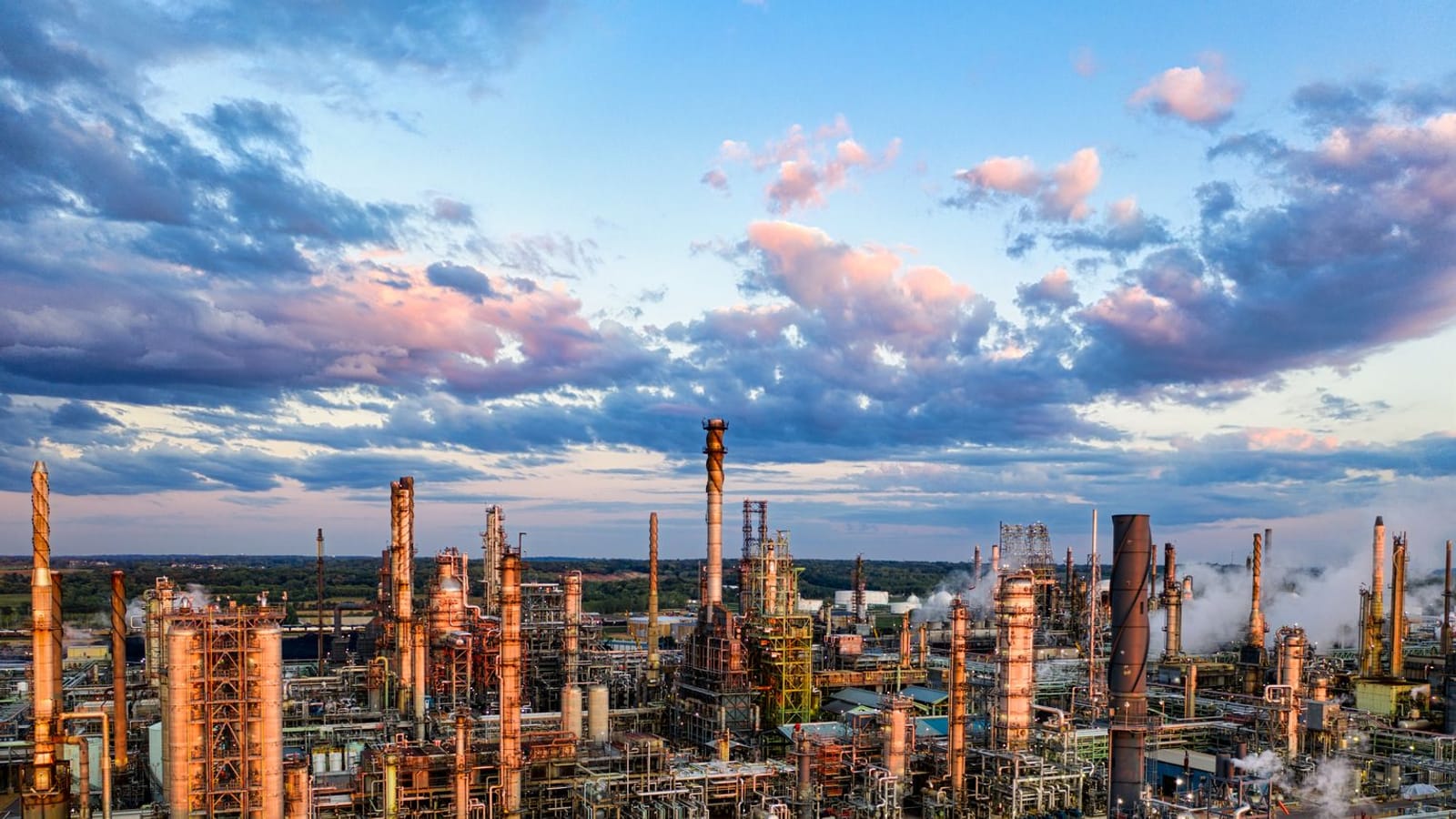 Stunning aerial shot of an oil refinery in Rosemount, MN, showcasing industrial complexity at sunset.