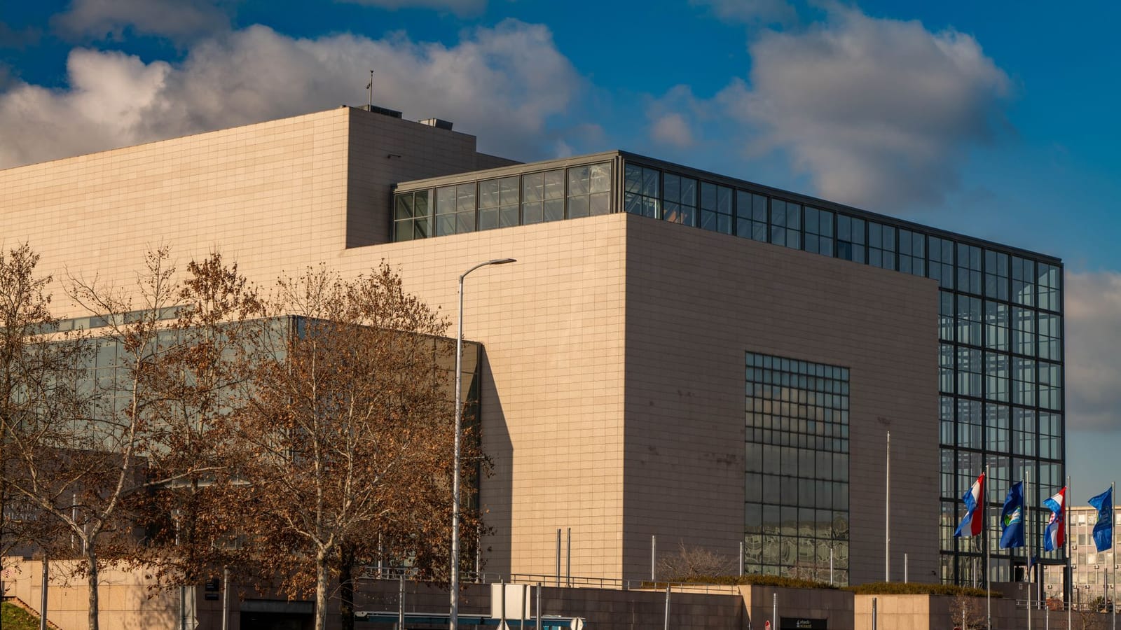 A contemporary glass and stone building in Zagreb, capturing modern architectural style.