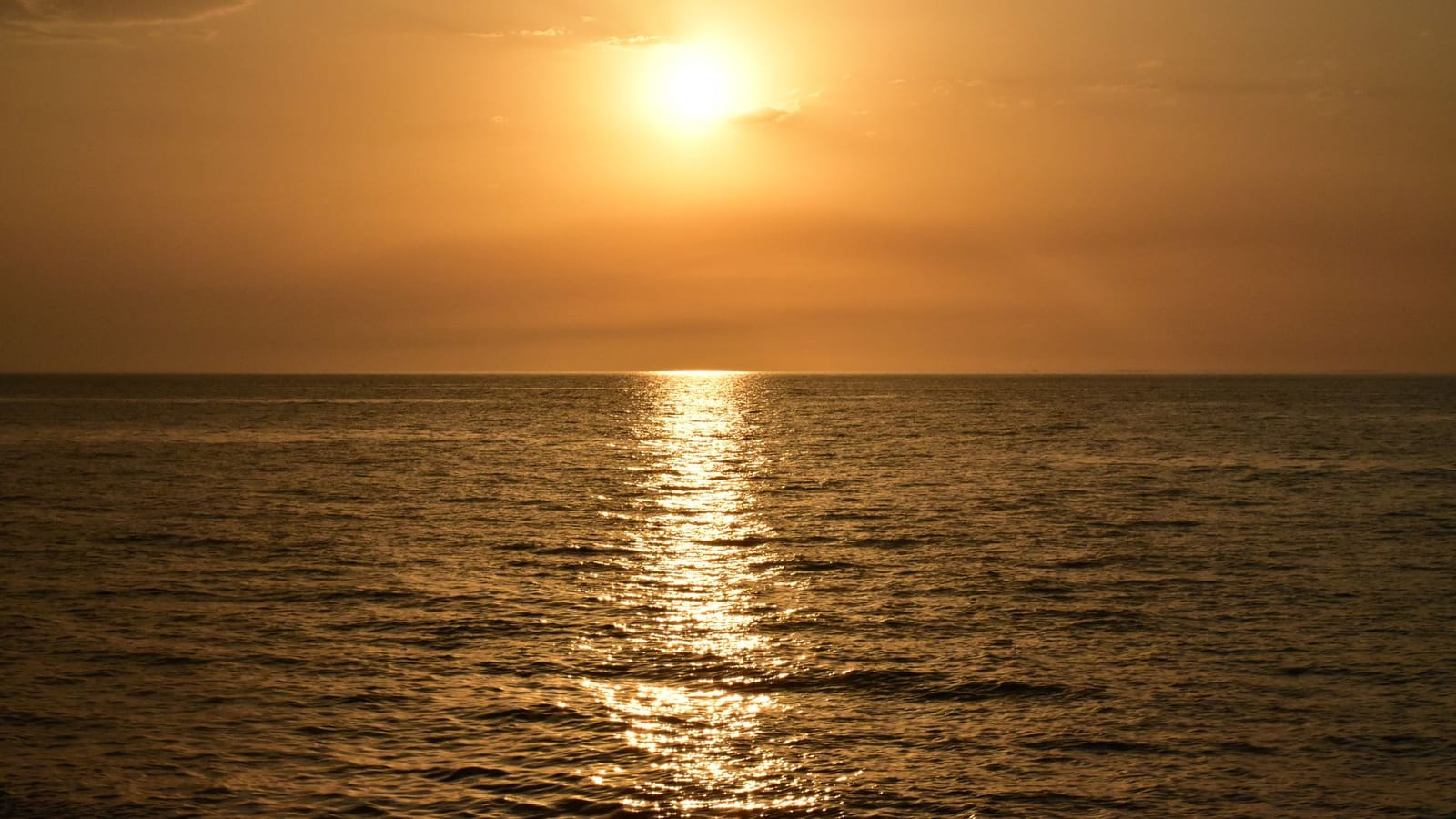 Captivating sunset view over the Caspian Sea in Gilan Province, Iran.