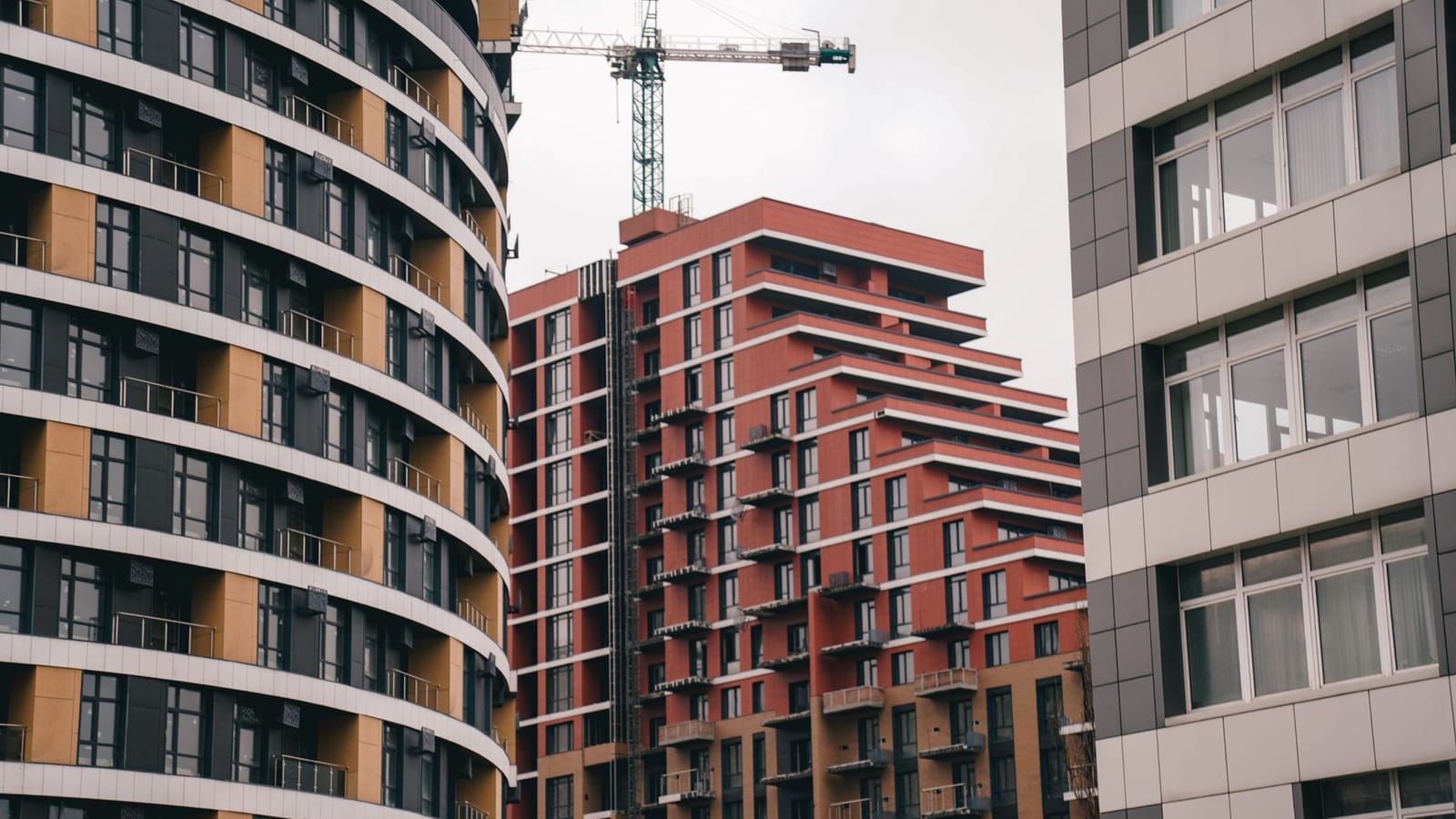 Contemporary urban architecture featuring high-rise apartment buildings in Kyiv, Ukraine.