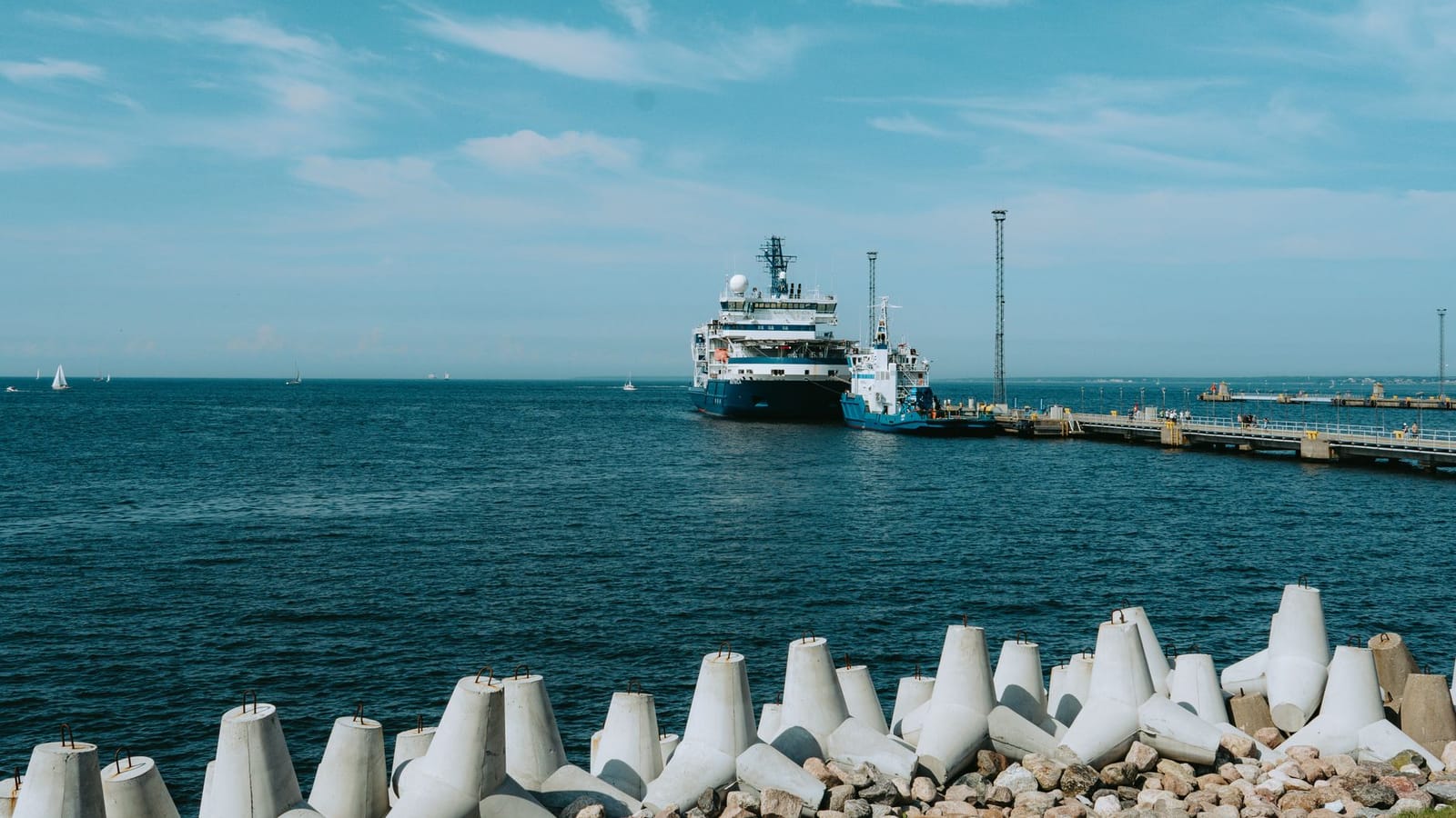 Scenic view of a cruise ship docked at Tallinn Harbor, capturing Estonia's coastal charm.