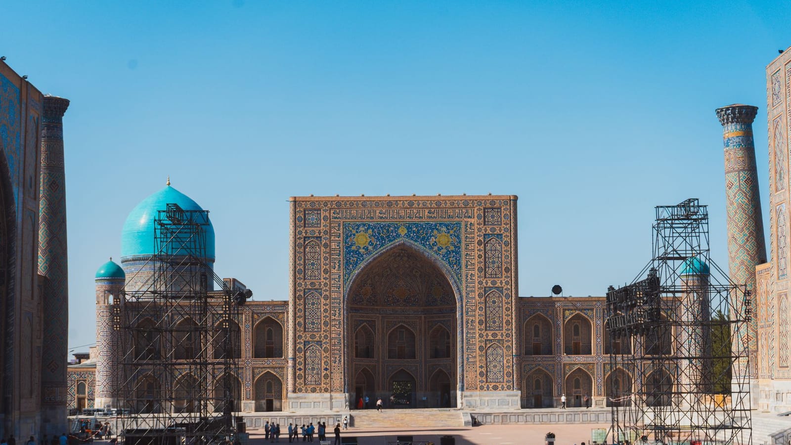 Explore the ancient beauty of Registan Square, Samarkand, with its intricate Islamic architecture.