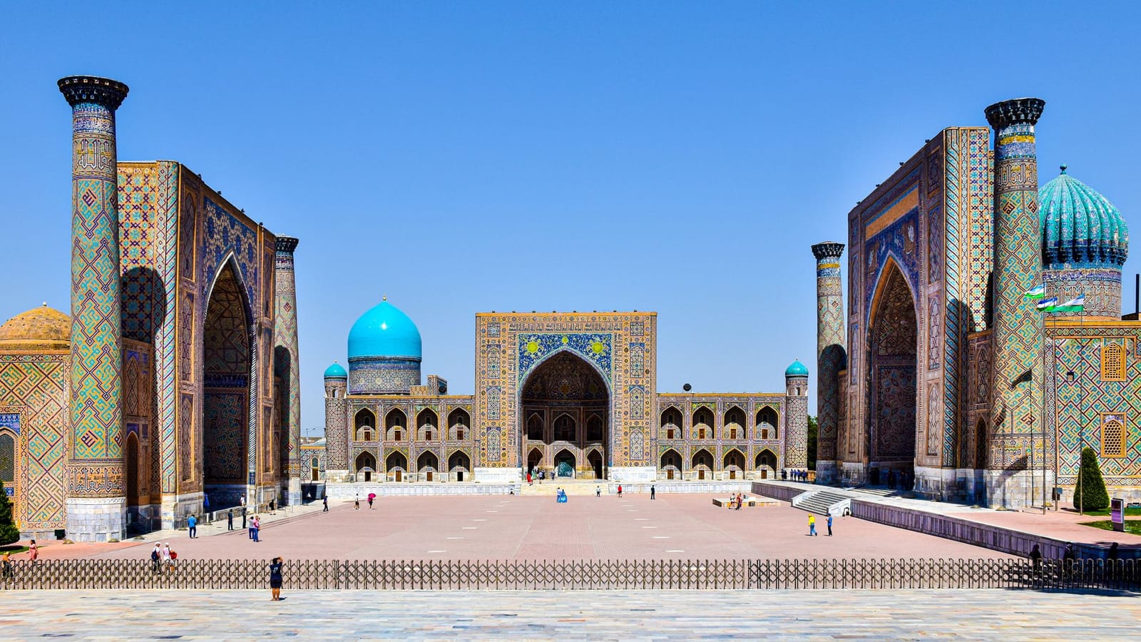 Explore the stunning architecture of Registan Square in Samarkand, Uzbekistan with vibrant mosaics and historical monuments.