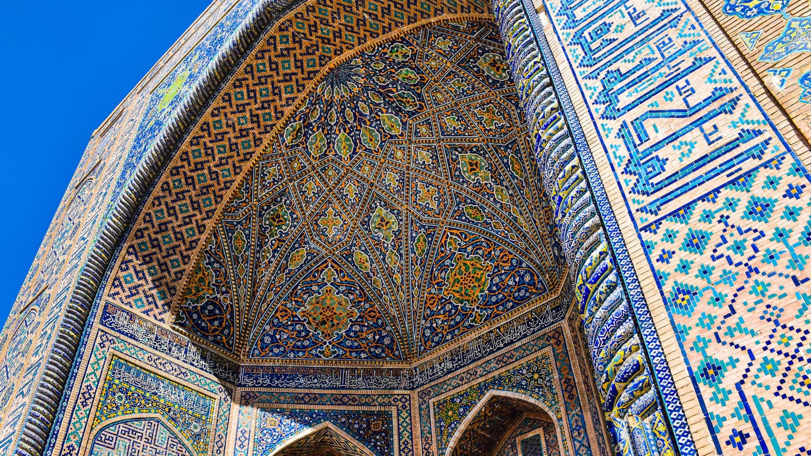 Discover the ornate tilework and Islamic architecture of Registan Square, Samarkand, Uzbekistan.
