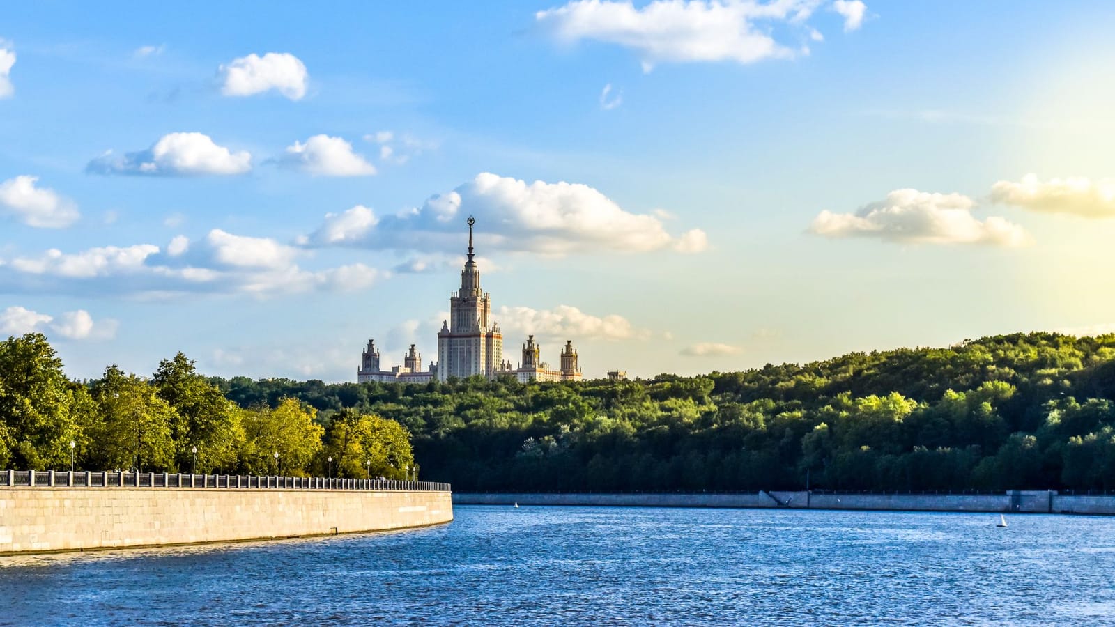 View of Moscow State University and the Moscow River under a clear summer sky.