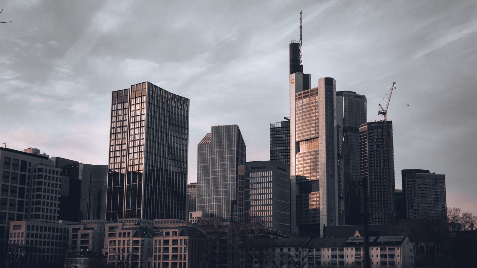 Stunning cityscape of Frankfurt am Main skyline at dusk with modern skyscrapers.